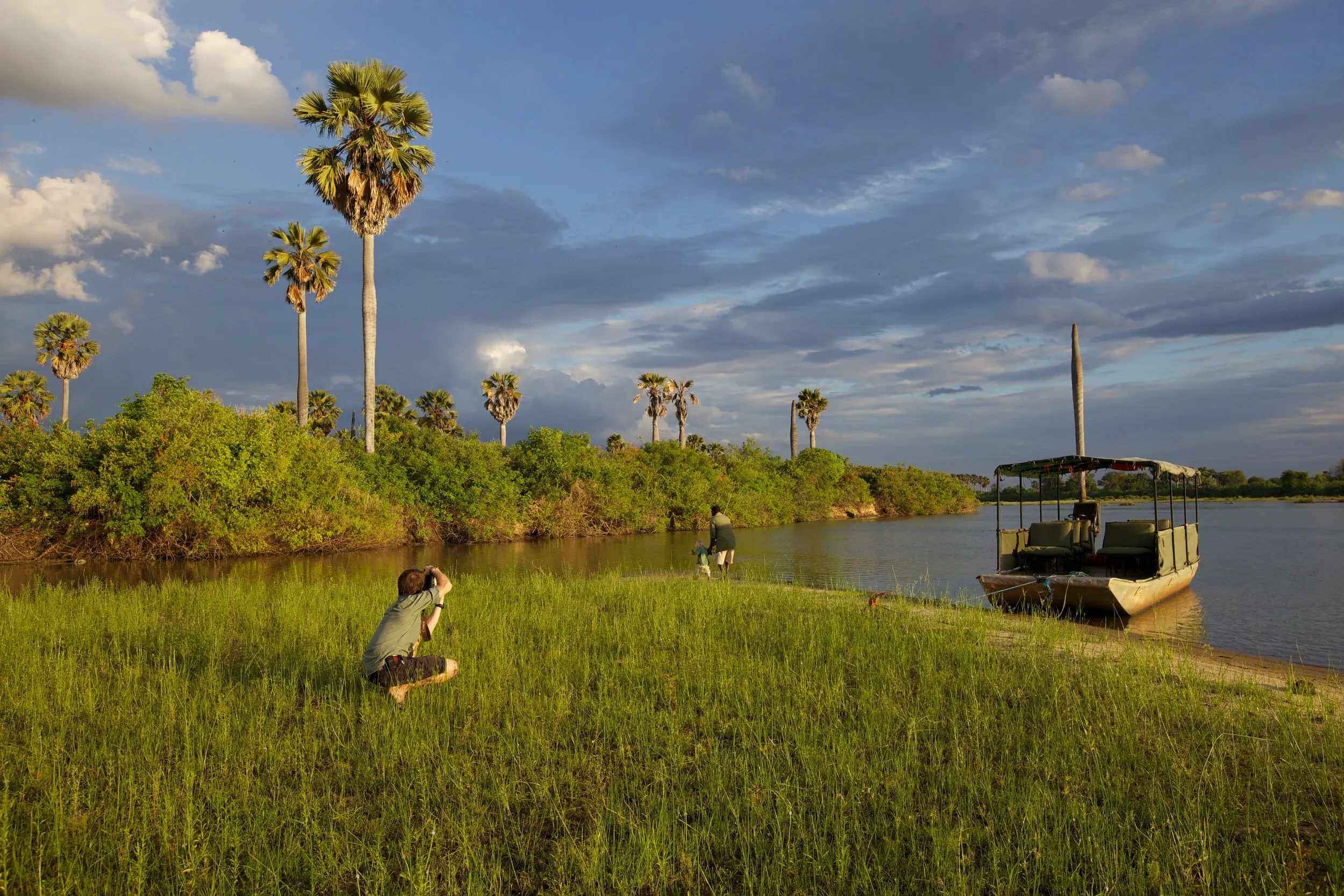 A boat safari gliding down the Rufiji River in the Selous Game Reserve, Tanzania