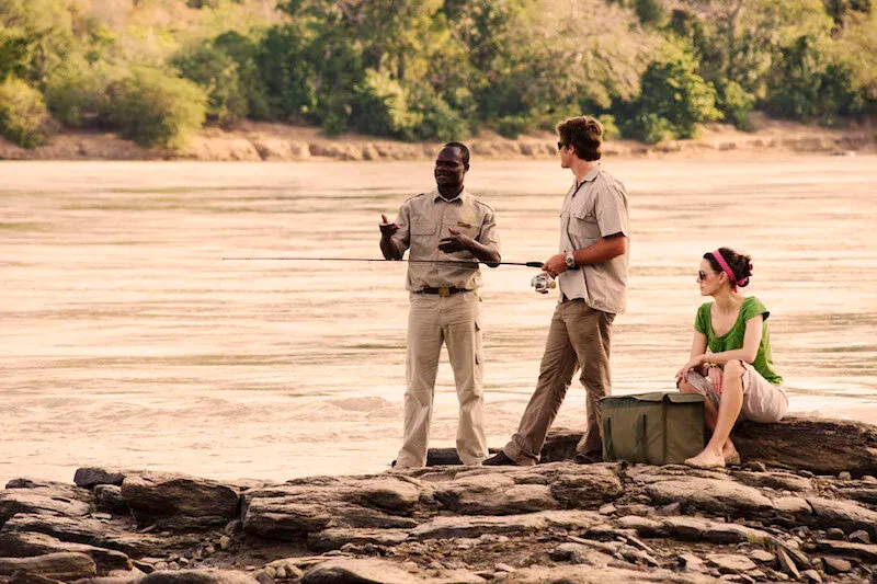 A game drive vehicle spotting wildlife in the Selous Game Reserve, Tanzania